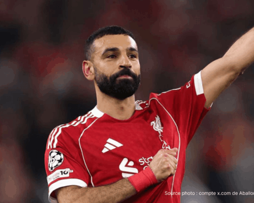 Mohamed Salah célébrant un but sous le maillot rouge de Liverpool à Anfield