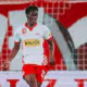 Joane Gadou défenseur central franco-ivoirien de 19 ans signe officiellement au Borussia Dortmund pour cinq saisons — annonce du 12 mai 2026